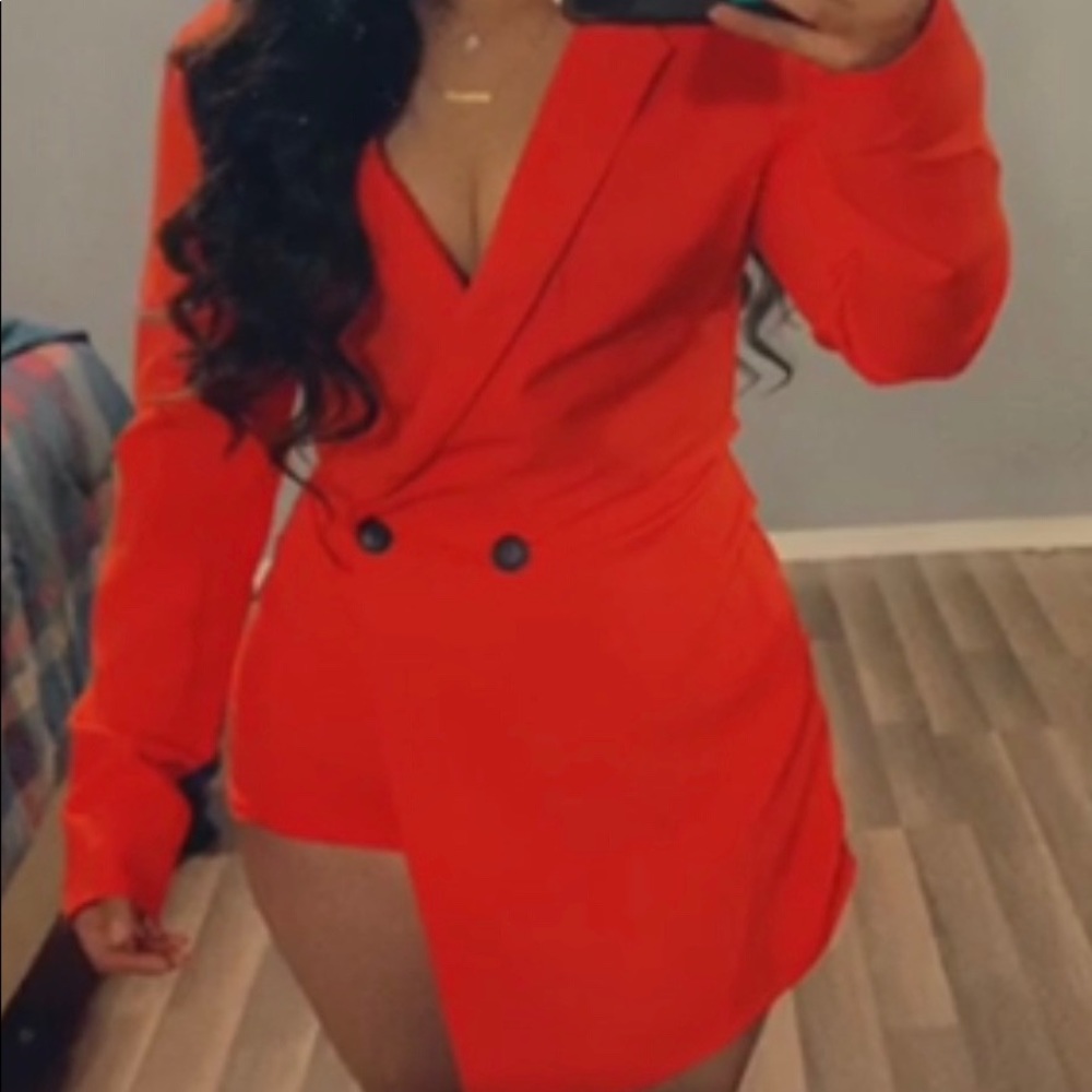 Bright red romper suit